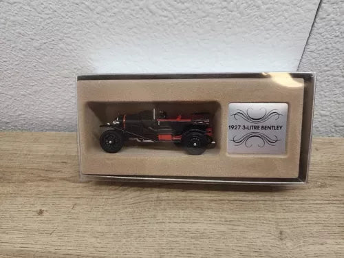 Diecast Bentley 1927 3-litre toy car in retail box, black with red detailing.