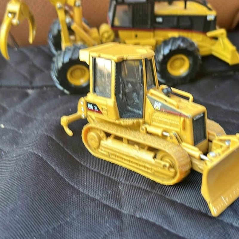 Yellow diecast bulldozer model with front blade, 1/50 scale