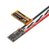 Brushless ESC speed controller PCB with orange label and red/white/black wires