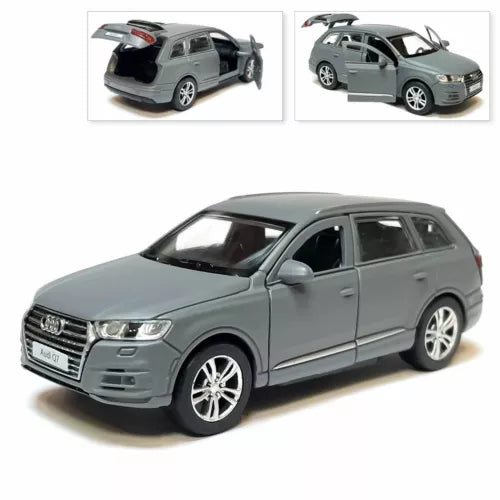 Gray diecast SUV model car, front three-quarter view, detailed wheels and grille