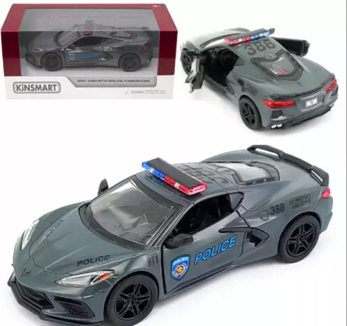 Grey police Corvette diecast toy car with open door, 1:36 scale