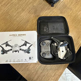 X-pack series drone in zippered hard case with spare props and controller