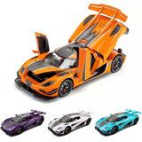 Orange diecast metal toy supercar with opening door, front 3/4 view; three mini car options shown