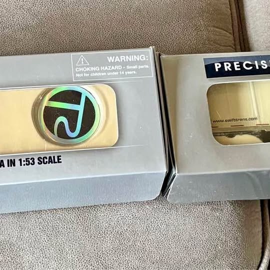 1:53 scale diecast tractor trailer replica in box with logo window