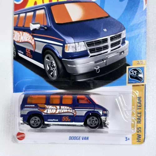 Blue and orange diecast Dodge Van in blister pack
