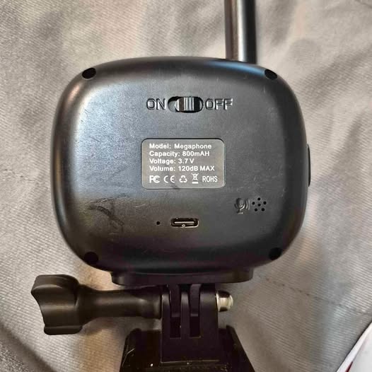 Black speakerphone unit with ON/OFF switch, USB-C port, and mounting bracket