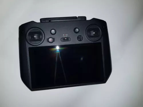 DJI RC Pro controller remote with dual joysticks, display screen, and ports