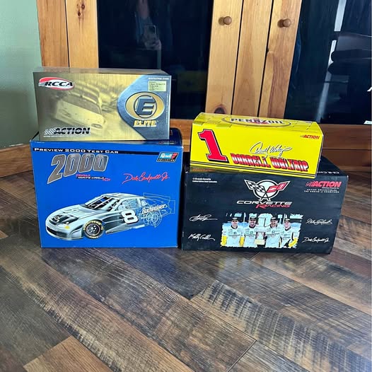 Diecast car bundle with two boxed cars: blue car box #8 and yellow box #1