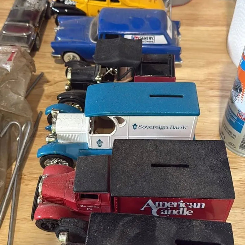 Blue and red diecast car piggy bank with black money-slot panels