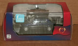 1:43 scale black diecast car model in clear display case, front view