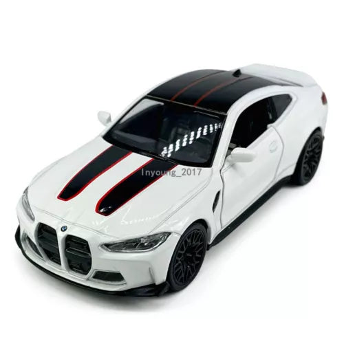 White BMW M4 CSL diecast model car with red racing stripes, black hood, black wheels