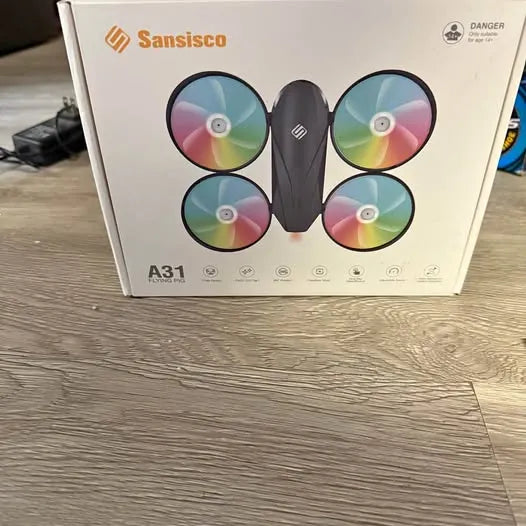 Quadcopter drone box showing four rainbow propellers and central body