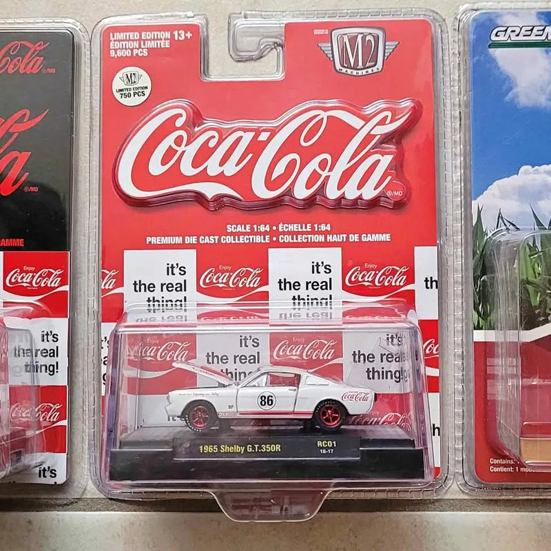 Diecast 1/64 Coca-Cola car model in blister packaging