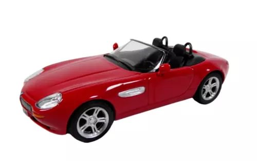 Red convertible diecast model car with black soft top, front view