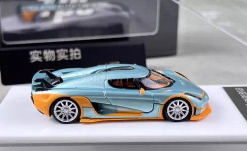1:64 scale ice blue racing sports diecast model car, side view