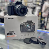 Canon EOS Rebel T7 camera and 18-55mm lens kit with lens caps
