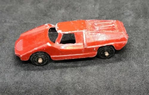 Vintage red diecast Fiat Abarth car with black wheels