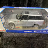 Diecast SUV model in retail box, Range Rover Sport, silver with black wheels