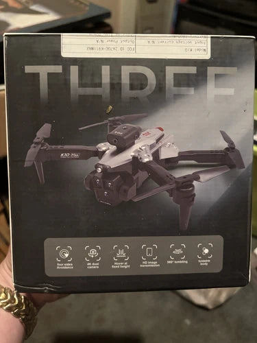Drone retail box with illustrated quadcopter and feature icons