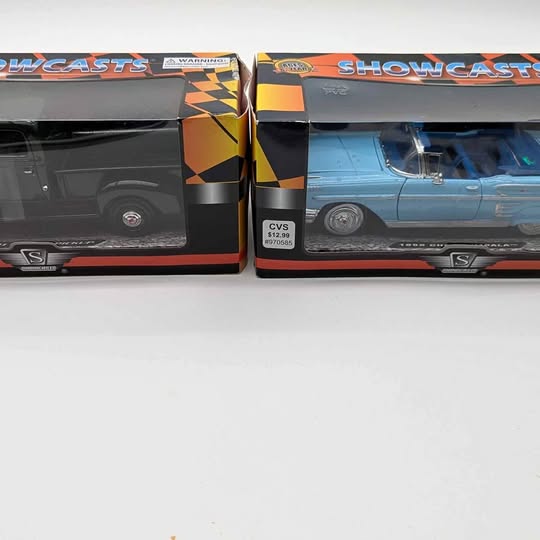Diecast truck and car set in retail boxes, black truck and light blue car with checkered trim