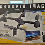 Black quadcopter drone with three-blade propellers, DX-5 branding on body