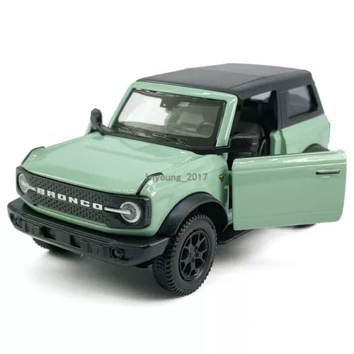 Green Ford Bronco 1:36 diecast toy car, front door open