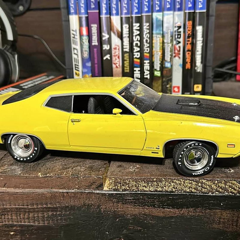 Yellow diecast classic coupe, 1:24 scale