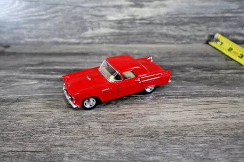Red 1955 Ford Thunderbird diecast model car, 1/36 scale, front three-quarter view