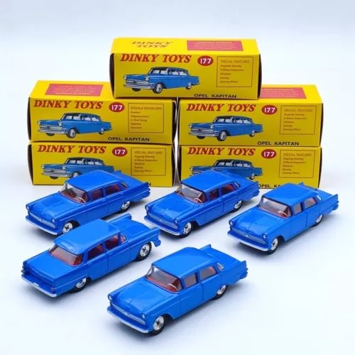 Set of five blue diecast model cars with packaging boxes