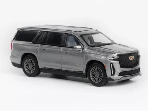 Silver diecast metal SUV sports model car with front grille and headlights