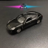 Black 1:36 diecast model car with silver trim, detailed windows and wheels