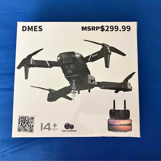 DMES dual camera drone in retail box with remote controller shown