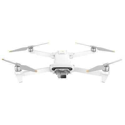 White quadcopter drone with 4 propellers and mounted camera gimbal