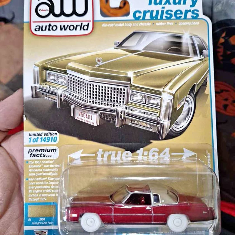 Red and gold diecast classic car model in clear blister package