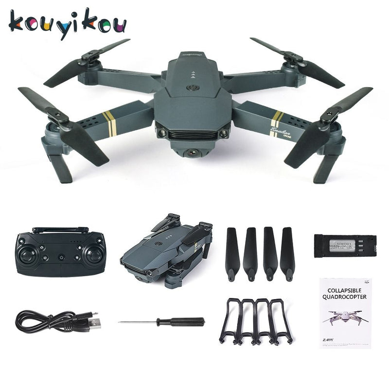 Gray quadcopter drone with four propellers, remote controller, battery and accessory parts