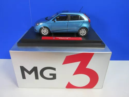 Boxed 1:18 scale diecast MG3 car model with blue body on display base