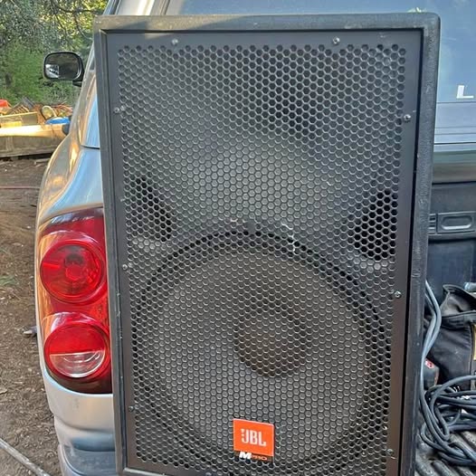 JBL M-Pro speaker with front metal grille and JBL logo