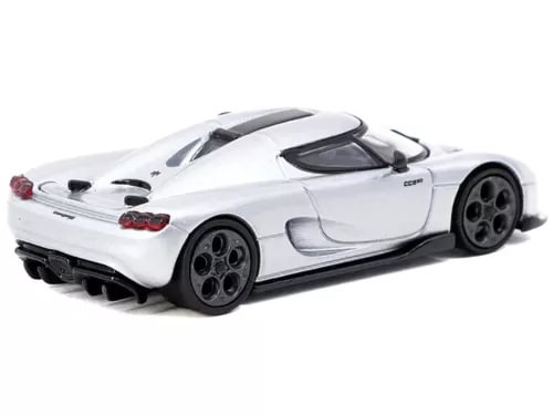White diecast sports car model with black wheels, rear side view
