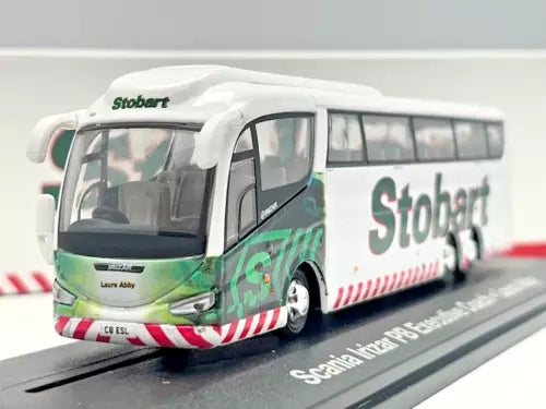 White and green diecast model coach bus with Stobart logo, front view.