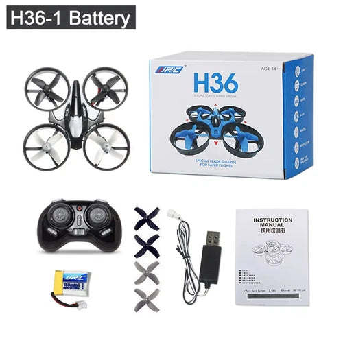 Mini RC drone kit with controller, spare blades, battery, and USB charger