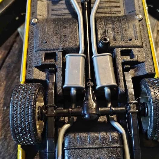 1969 Plymouth Barracuda 1:18 diecast car chassis with wheels and exhaust pipes