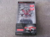 Red RC quadcopter drone in retail packaging box