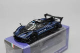 1/64 scale blue and black diecast sports car model with rear wing, on base