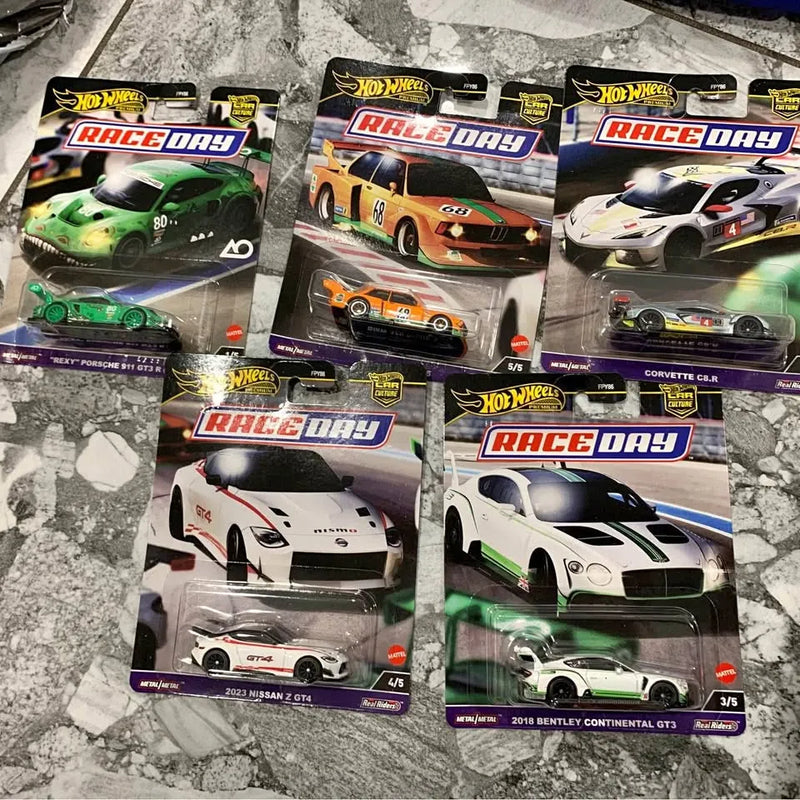 Hot Wheels Race Day diecast model set in blister packs, cars and labels visible