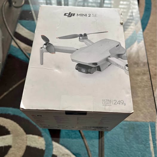DJI Mini 2 SE drone retail box with pictured drone