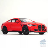 Red alloy diecast model car, front three-quarter view with black wheels.