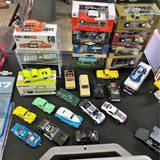 1/64 diecast model car collection with boxed cars and loose vehicles
