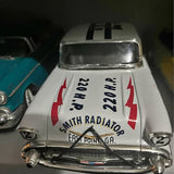 White diecast car front with grille, headlights, and racing number 22