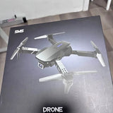 SMS drone in retail box, foldable quadcopter with four propellers and LED accents