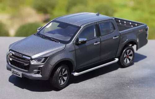 Gray diecast pickup truck model, front-left three-quarter view